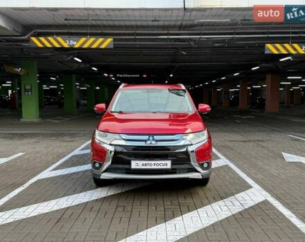 Красный Мицубиси Аутлендер, объемом двигателя 3 л и пробегом 167 тыс. км за 16990 $, фото 2 на Automoto.ua