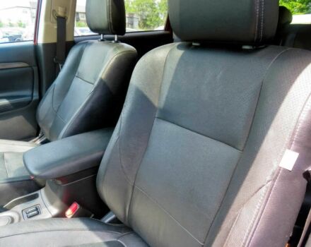 Червоний Міцубісі Аутлендер, об'ємом двигуна 2.4 л та пробігом 71 тис. км за 10800 $, фото 10 на Automoto.ua