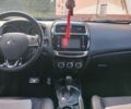 Красный Мицубиси Аутлендер, объемом двигателя 2.4 л и пробегом 185 тыс. км за 12200 $, фото 16 на Automoto.ua