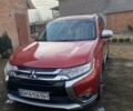 Червоний Міцубісі Аутлендер, об'ємом двигуна 2.4 л та пробігом 188 тис. км за 16000 $, фото 1 на Automoto.ua