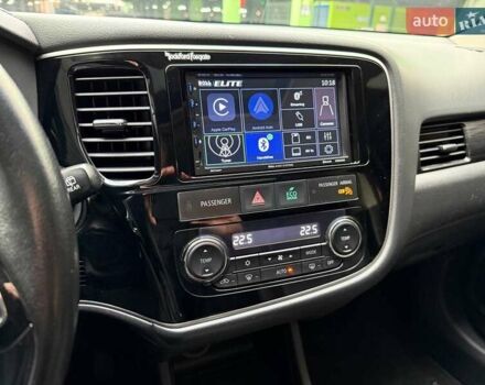 Красный Мицубиси Аутлендер, объемом двигателя 3 л и пробегом 167 тыс. км за 16990 $, фото 25 на Automoto.ua