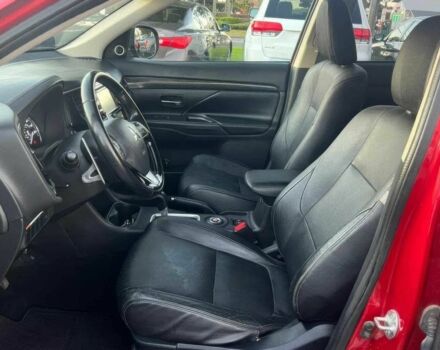 Красный Мицубиси Аутлендер, объемом двигателя 3 л и пробегом 71 тыс. км за 3400 $, фото 5 на Automoto.ua