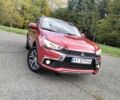 Красный Мицубиси Аутлендер, объемом двигателя 2.4 л и пробегом 185 тыс. км за 12200 $, фото 3 на Automoto.ua