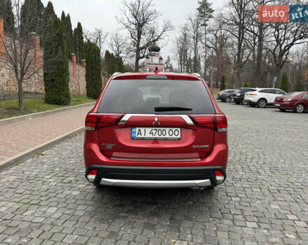 Красный Мицубиси Аутлендер, объемом двигателя 2.4 л и пробегом 225 тыс. км за 11900 $, фото 6 на Automoto.ua