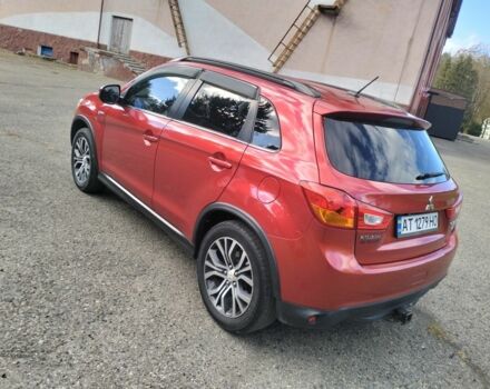 Красный Мицубиси Аутлендер, объемом двигателя 2.4 л и пробегом 185 тыс. км за 12200 $, фото 6 на Automoto.ua