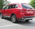 Красный Мицубиси Аутлендер, объемом двигателя 2.4 л и пробегом 70 тыс. км за 6400 $, фото 3 на Automoto.ua