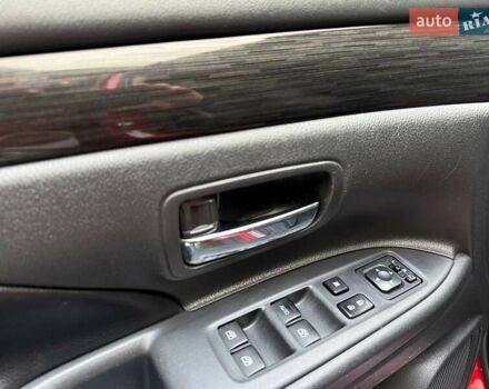 Красный Мицубиси Аутлендер, объемом двигателя 3 л и пробегом 167 тыс. км за 16990 $, фото 19 на Automoto.ua