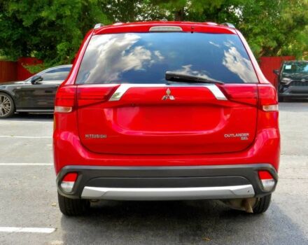 Червоний Міцубісі Аутлендер, об'ємом двигуна 2.4 л та пробігом 71 тис. км за 10800 $, фото 4 на Automoto.ua