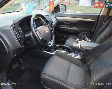 Красный Мицубиси Аутлендер, объемом двигателя 2.36 л и пробегом 118 тыс. км за 14000 $, фото 4 на Automoto.ua