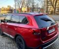 Красный Мицубиси Аутлендер, объемом двигателя 2.4 л и пробегом 134 тыс. км за 13990 $, фото 2 на Automoto.ua