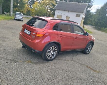 Красный Мицубиси Аутлендер, объемом двигателя 2.4 л и пробегом 185 тыс. км за 12200 $, фото 7 на Automoto.ua