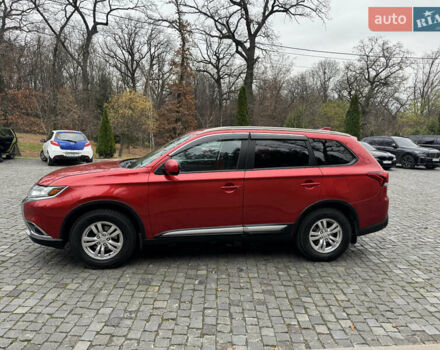 Красный Мицубиси Аутлендер, объемом двигателя 2.4 л и пробегом 225 тыс. км за 11900 $, фото 3 на Automoto.ua