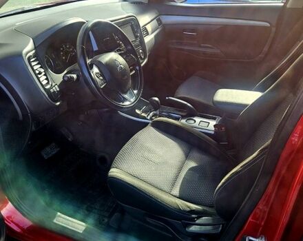 Красный Мицубиси Аутлендер, объемом двигателя 2.4 л и пробегом 174 тыс. км за 14300 $, фото 3 на Automoto.ua