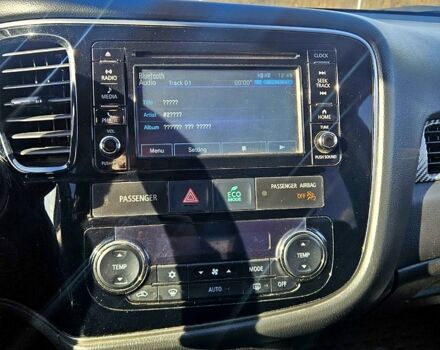 Красный Мицубиси Аутлендер, объемом двигателя 2.4 л и пробегом 174 тыс. км за 14300 $, фото 9 на Automoto.ua