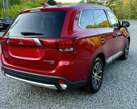 Красный Мицубиси Аутлендер, объемом двигателя 3 л и пробегом 60 тыс. км за 4900 $, фото 6 на Automoto.ua