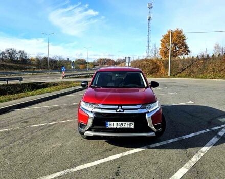 Красный Мицубиси Аутлендер, объемом двигателя 2.4 л и пробегом 174 тыс. км за 14300 $, фото 2 на Automoto.ua