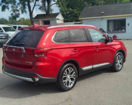 Красный Мицубиси Аутлендер, объемом двигателя 2.4 л и пробегом 51 тыс. км за 8900 $, фото 3 на Automoto.ua