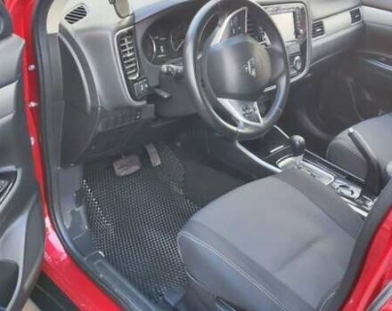 Красный Мицубиси Аутлендер, объемом двигателя 2.36 л и пробегом 80 тыс. км за 16500 $, фото 12 на Automoto.ua