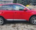 Красный Мицубиси Аутлендер, объемом двигателя 2.36 л и пробегом 80 тыс. км за 16500 $, фото 2 на Automoto.ua