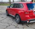 Красный Мицубиси Аутлендер, объемом двигателя 2.36 л и пробегом 80 тыс. км за 16500 $, фото 3 на Automoto.ua