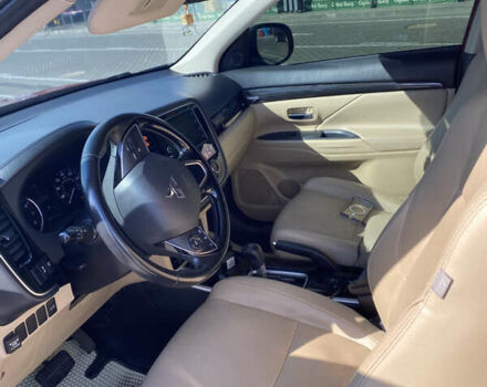 Красный Мицубиси Аутлендер, объемом двигателя 2.4 л и пробегом 113 тыс. км за 15900 $, фото 8 на Automoto.ua