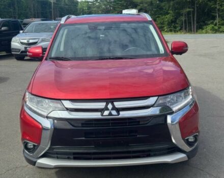 Красный Мицубиси Аутлендер, объемом двигателя 2.4 л и пробегом 51 тыс. км за 8900 $, фото 1 на Automoto.ua