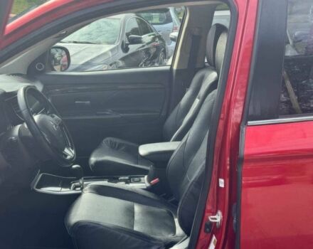 Красный Мицубиси Аутлендер, объемом двигателя 2.4 л и пробегом 51 тыс. км за 8900 $, фото 6 на Automoto.ua