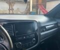 Красный Мицубиси Аутлендер, объемом двигателя 2.36 л и пробегом 60 тыс. км за 15500 $, фото 12 на Automoto.ua