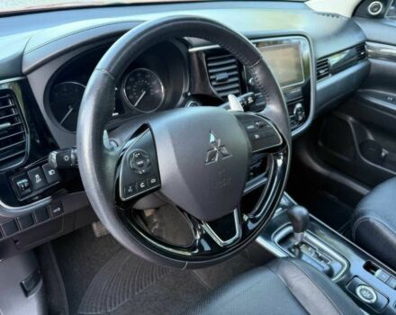 Красный Мицубиси Аутлендер, объемом двигателя 3 л и пробегом 57 тыс. км за 13200 $, фото 9 на Automoto.ua