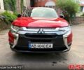Червоний Міцубісі Аутлендер, об'ємом двигуна 2.4 л та пробігом 12 тис. км за 14000 $, фото 2 на Automoto.ua