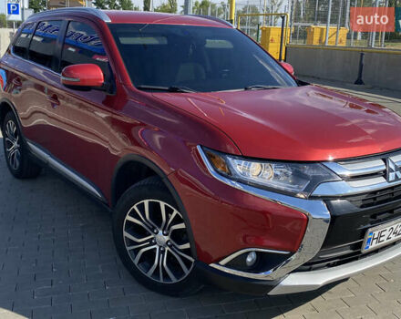 Красный Мицубиси Аутлендер, объемом двигателя 2.4 л и пробегом 113 тыс. км за 15900 $, фото 2 на Automoto.ua