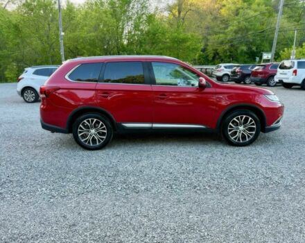 Красный Мицубиси Аутлендер, объемом двигателя 3 л и пробегом 57 тыс. км за 13200 $, фото 7 на Automoto.ua