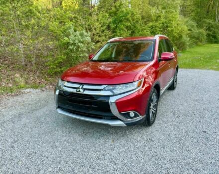 Красный Мицубиси Аутлендер, объемом двигателя 3 л и пробегом 57 тыс. км за 13200 $, фото 2 на Automoto.ua