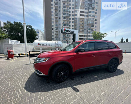 Красный Мицубиси Аутлендер, объемом двигателя 2.4 л и пробегом 107 тыс. км за 16900 $, фото 8 на Automoto.ua