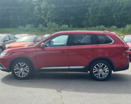 Красный Мицубиси Аутлендер, объемом двигателя 2.4 л и пробегом 51 тыс. км за 8900 $, фото 2 на Automoto.ua