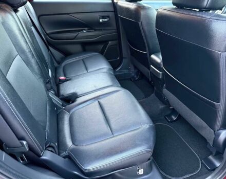 Красный Мицубиси Аутлендер, объемом двигателя 3 л и пробегом 60 тыс. км за 4900 $, фото 13 на Automoto.ua