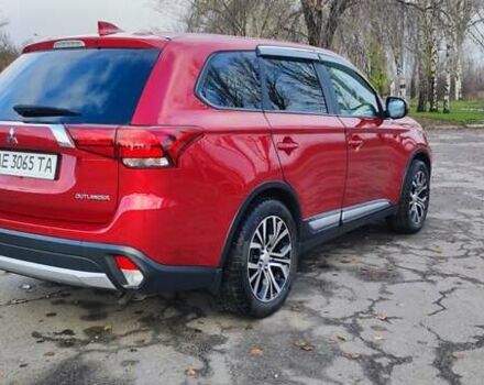 Красный Мицубиси Аутлендер, объемом двигателя 2.36 л и пробегом 80 тыс. км за 16500 $, фото 4 на Automoto.ua