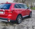 Красный Мицубиси Аутлендер, объемом двигателя 2.36 л и пробегом 80 тыс. км за 16500 $, фото 4 на Automoto.ua