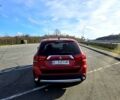Красный Мицубиси Аутлендер, объемом двигателя 2.4 л и пробегом 174 тыс. км за 14300 $, фото 1 на Automoto.ua