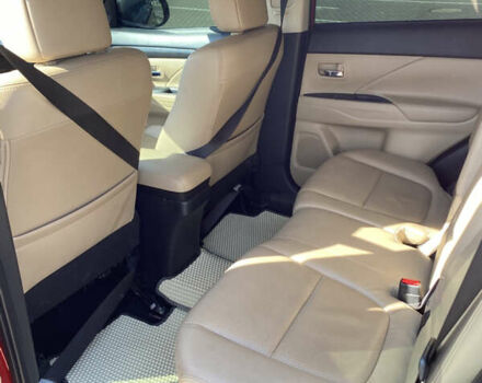 Красный Мицубиси Аутлендер, объемом двигателя 2.4 л и пробегом 113 тыс. км за 15900 $, фото 7 на Automoto.ua