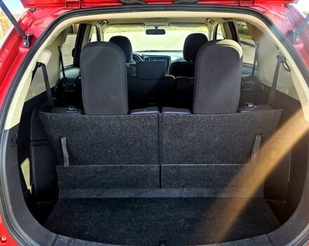 Красный Мицубиси Аутлендер, объемом двигателя 2.4 л и пробегом 174 тыс. км за 14300 $, фото 7 на Automoto.ua