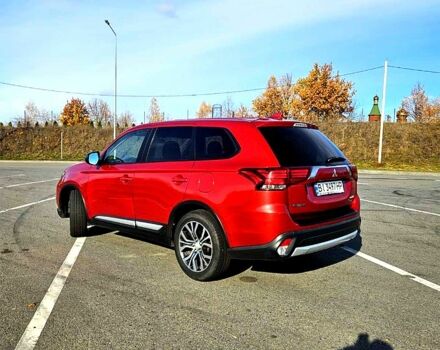 Красный Мицубиси Аутлендер, объемом двигателя 2.4 л и пробегом 174 тыс. км за 14300 $, фото 12 на Automoto.ua