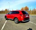 Красный Мицубиси Аутлендер, объемом двигателя 2.4 л и пробегом 174 тыс. км за 14300 $, фото 12 на Automoto.ua