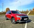 Красный Мицубиси Аутлендер, объемом двигателя 2.4 л и пробегом 174 тыс. км за 14300 $, фото 1 на Automoto.ua