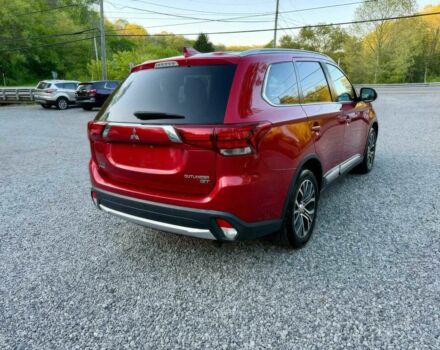 Красный Мицубиси Аутлендер, объемом двигателя 3 л и пробегом 57 тыс. км за 13200 $, фото 6 на Automoto.ua