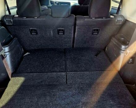 Красный Мицубиси Аутлендер, объемом двигателя 2.4 л и пробегом 174 тыс. км за 14300 $, фото 6 на Automoto.ua