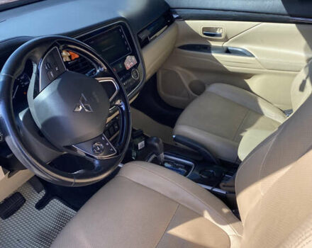 Красный Мицубиси Аутлендер, объемом двигателя 2.4 л и пробегом 113 тыс. км за 15900 $, фото 11 на Automoto.ua