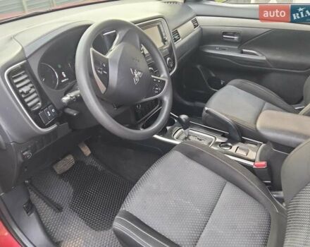 Красный Мицубиси Аутлендер, объемом двигателя 2.36 л и пробегом 110 тыс. км за 16800 $, фото 13 на Automoto.ua