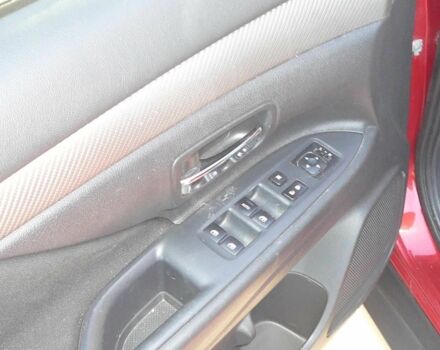 Красный Мицубиси Аутлендер, объемом двигателя 2.4 л и пробегом 117 тыс. км за 10500 $, фото 7 на Automoto.ua