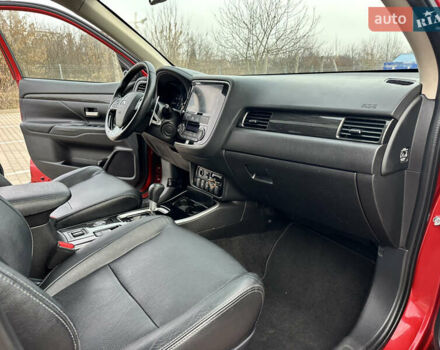 Красный Мицубиси Аутлендер, объемом двигателя 2.2 л и пробегом 118 тыс. км за 20999 $, фото 55 на Automoto.ua